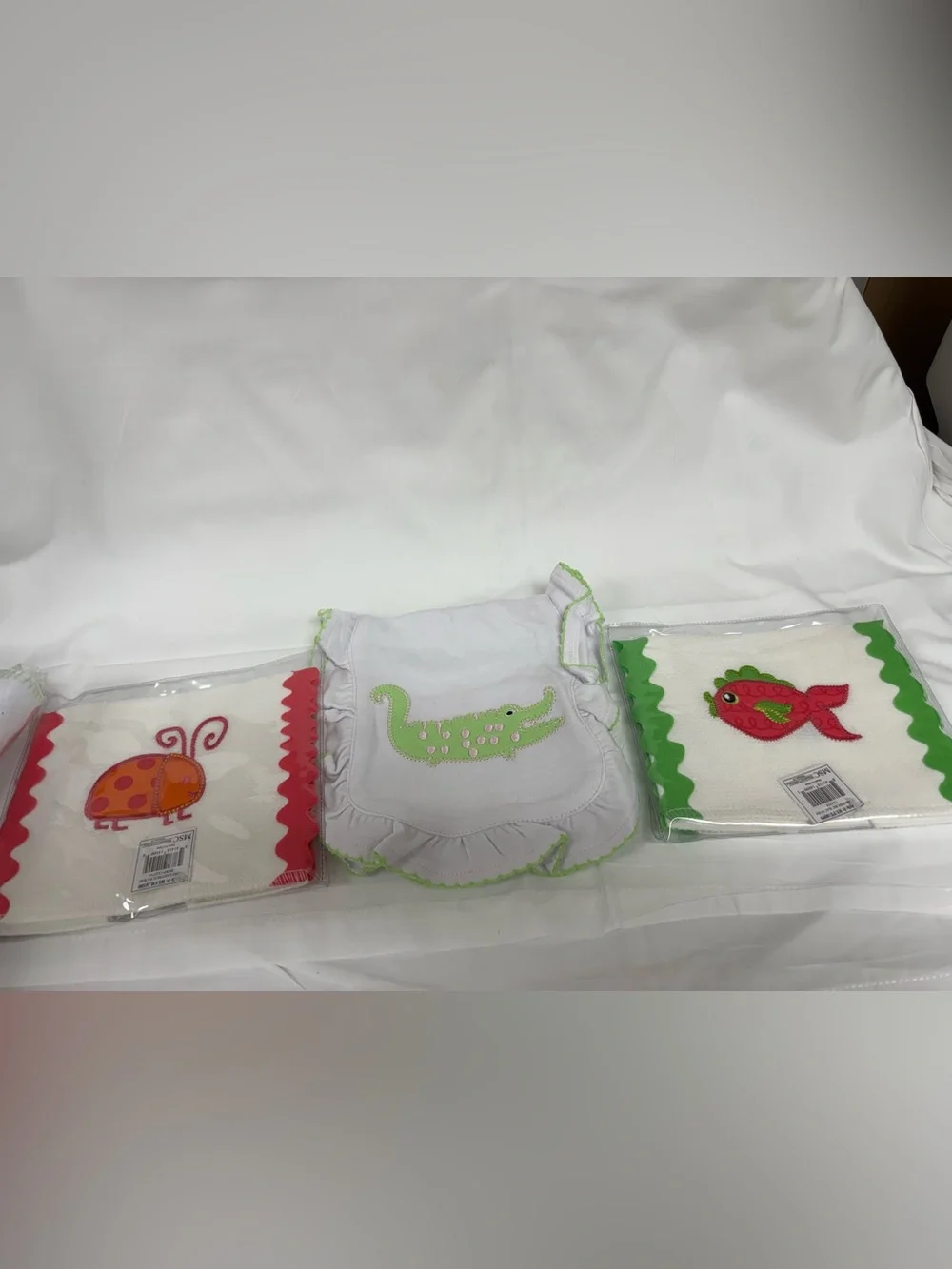 Three new Cute Applique burp cloths for baby girl.